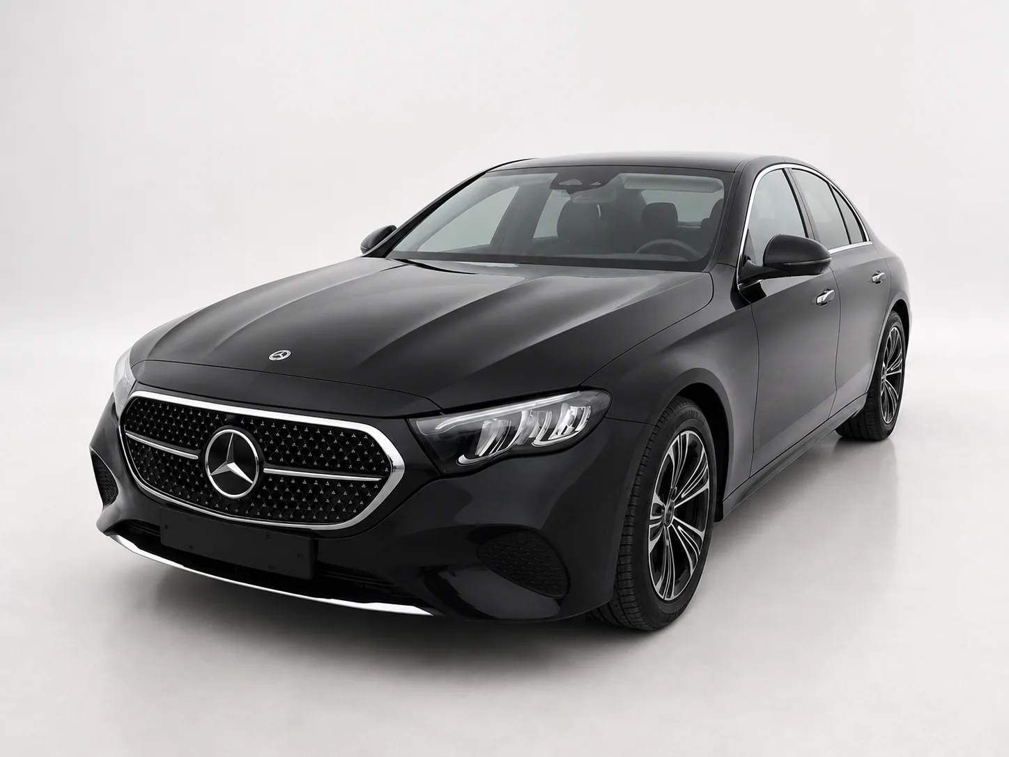 Mercedes-Benz E-Class business sedan — studio view, front three-quarter · Helsinki Airport Taxi