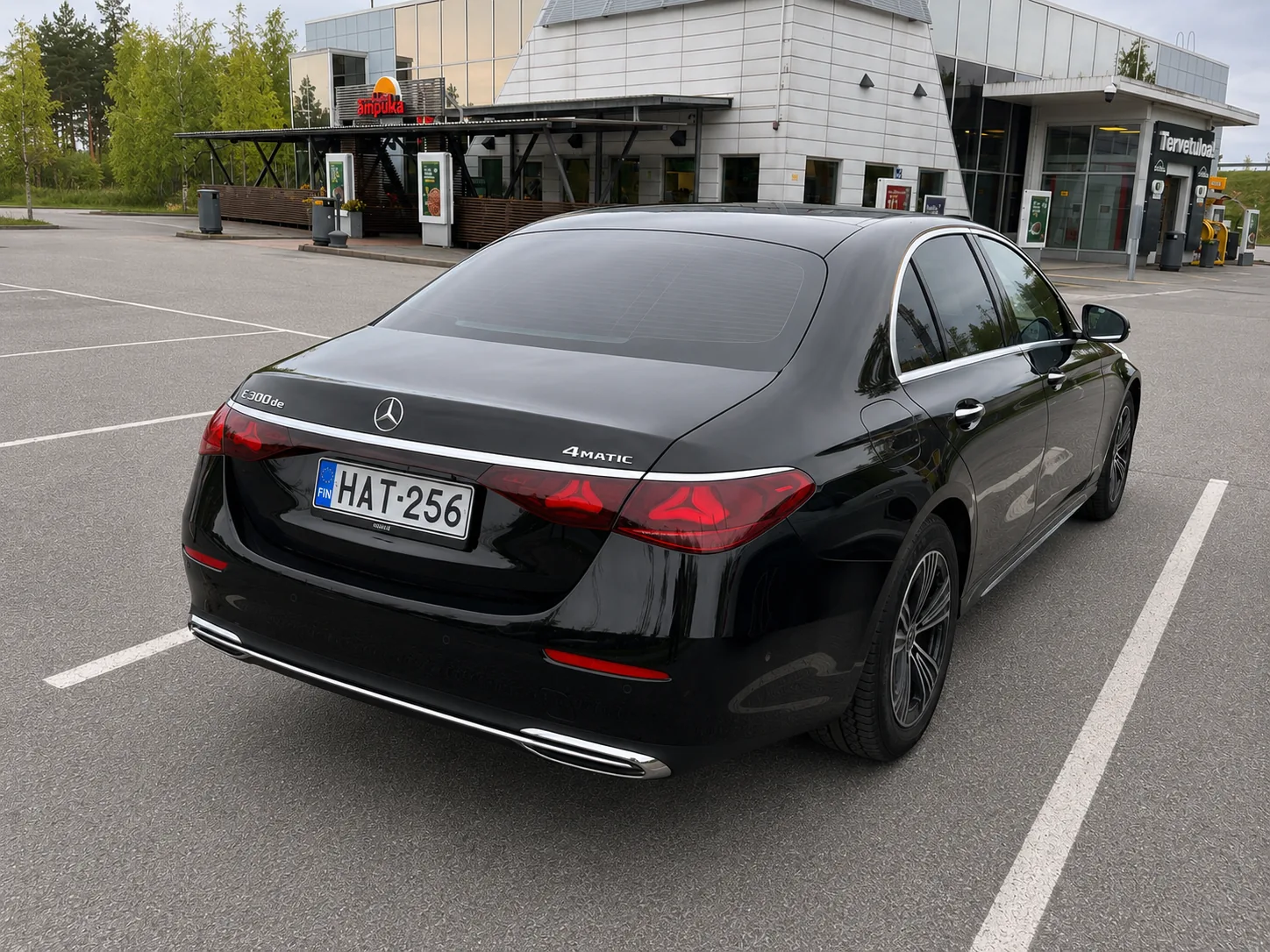 Mercedes-Benz E-Class business sedan — rear three-quarter view · Helsinki Airport Taxi