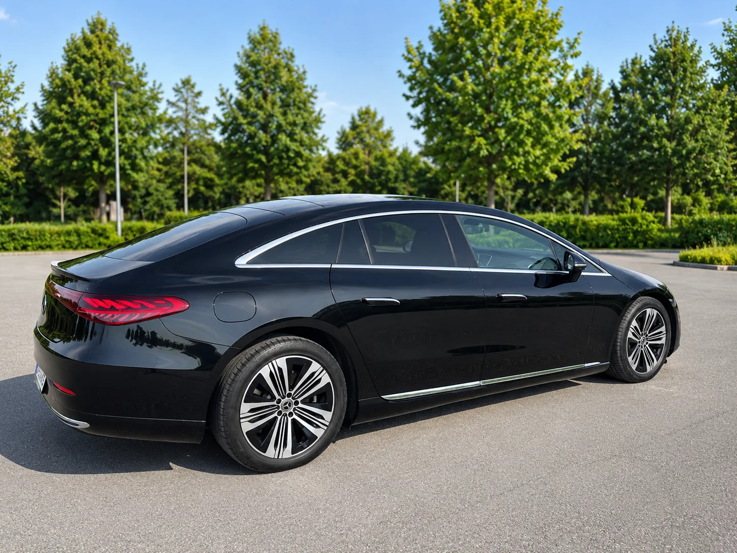 Mercedes-Benz EQS first-class sedan of Helsinki Airport Taxi, rear three-quarter view